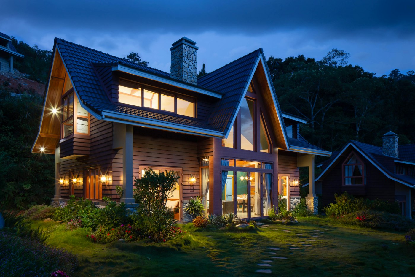 Home glowing at dusk